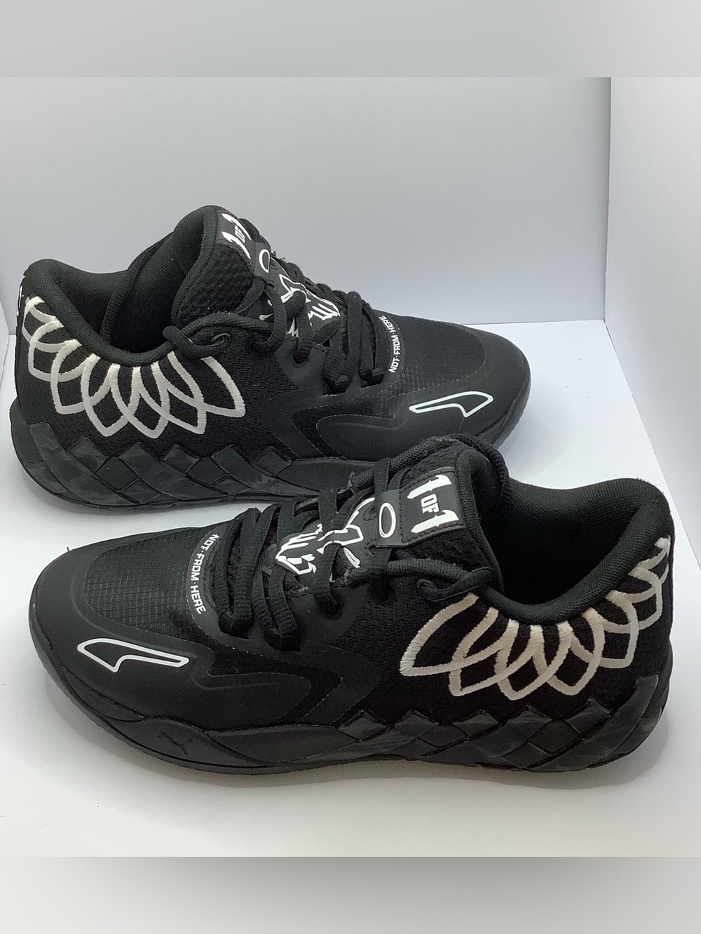 Puma Kids Black Sneakers with White Accents